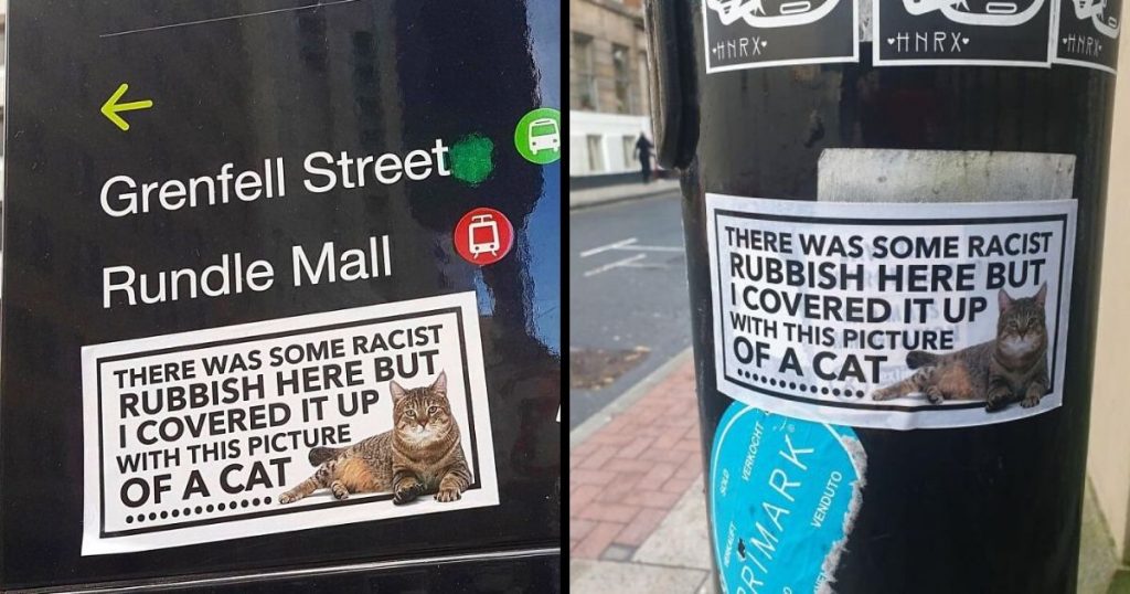 Someone In Manchester Keeps Covering Up Racist Graffiti With Cat Stickers